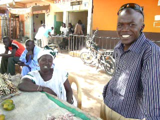 Moussa, IMCEC Loan Officer, with a Kiva Borrower