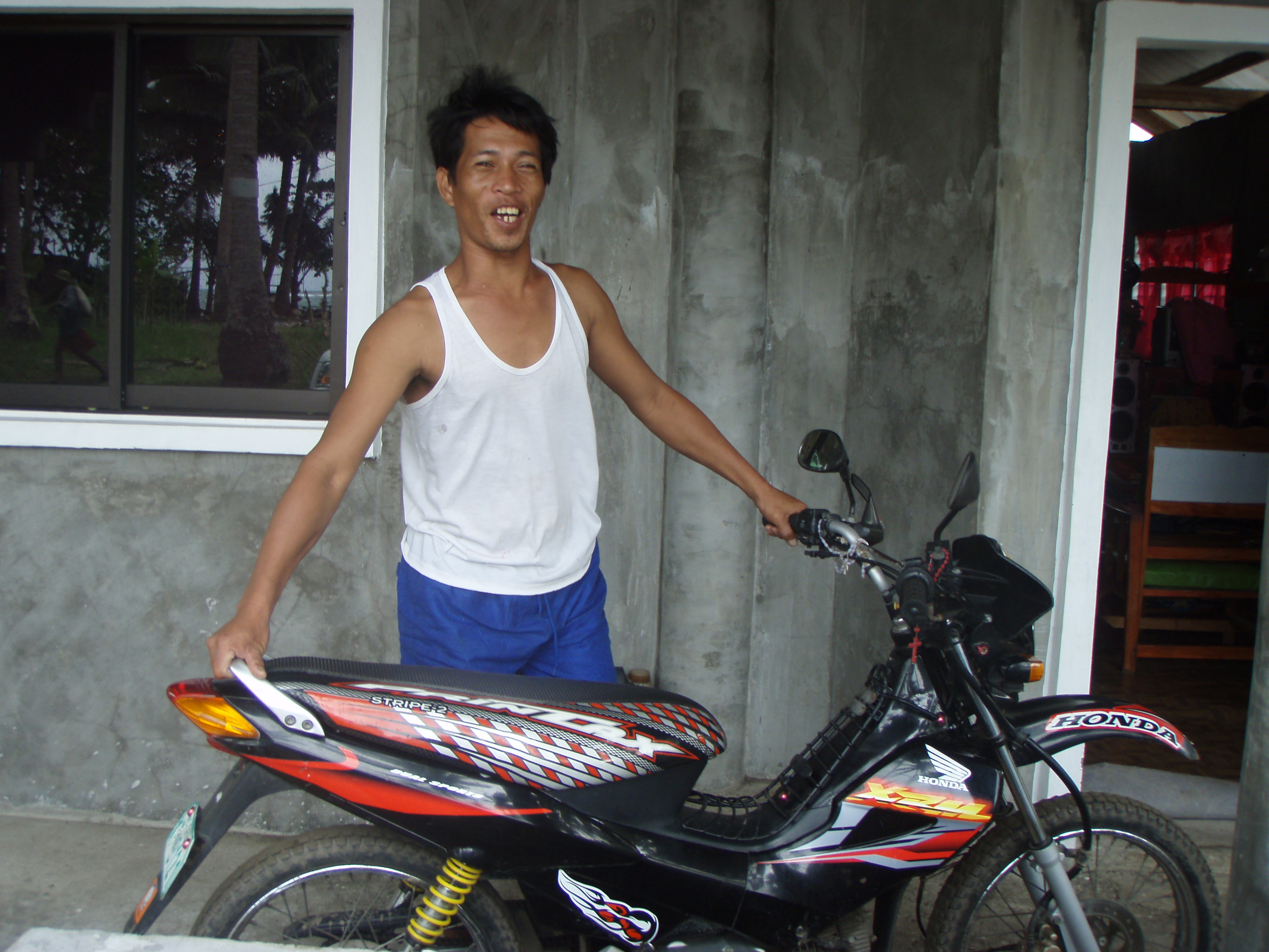 Mr. Morequio and his motorbike