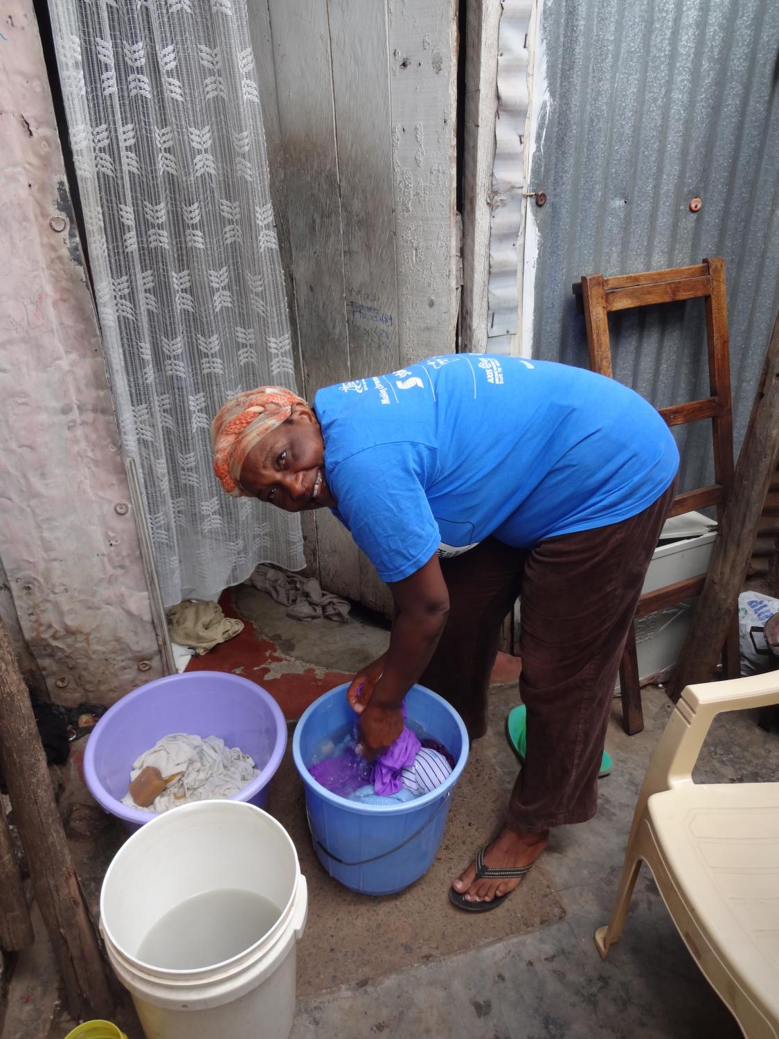 water using lift clothes wash smep loans kenya communities kiva mary